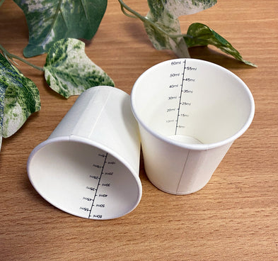 Biodegradable Disposable 60ml Paper Medicine Cup - Pack of 100 - Product showcase image 1 at LFA First Response
